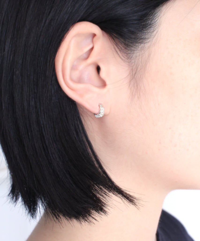 silver/white topaz pierce